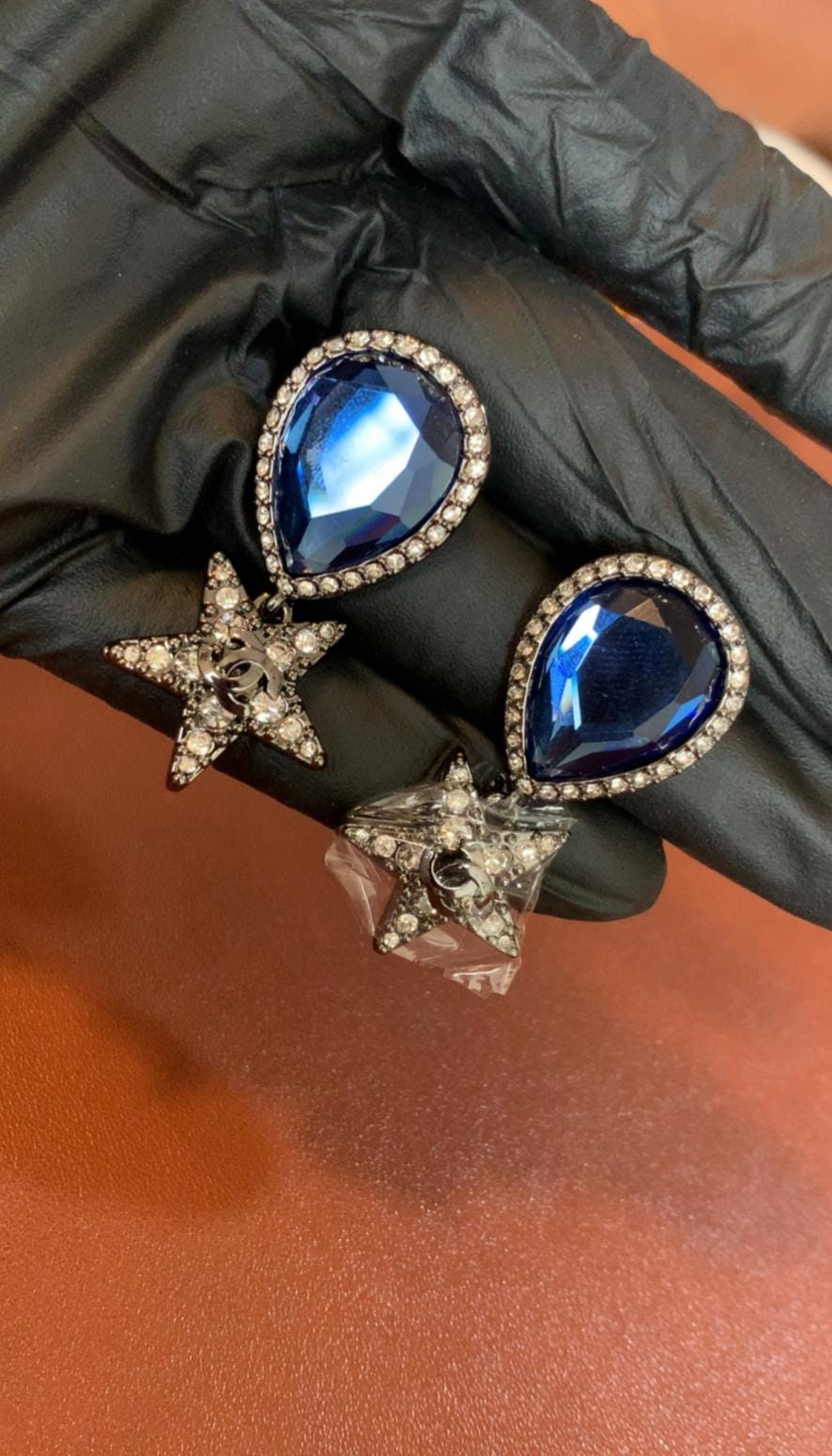 Crystal Star Drop Earrings with Blue Stone Accent