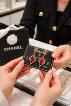 Gold-Tone Geometric Drop Earrings with Red Stone Accent