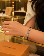 Minimalist Charm Bracelet with Monochrome Accents