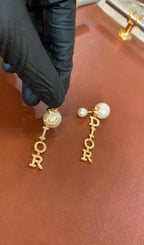Elegant Gold-Tone Pearl Drop Earrings with Letter Charm Design